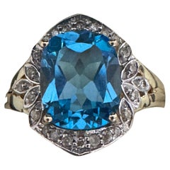 Anello da cocktail in oro 14K con diamante e topazio blu da 4,37 carati