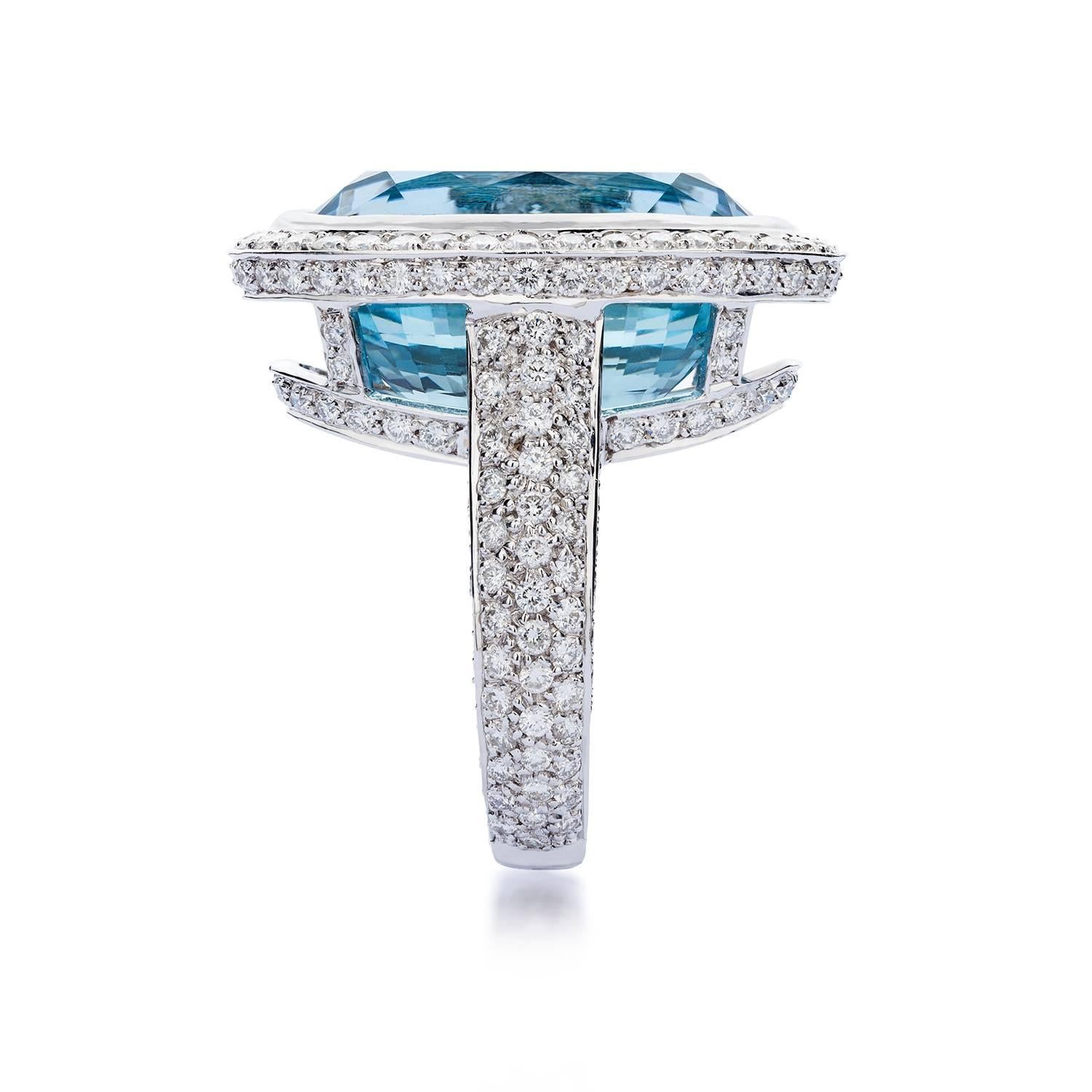 This is a Lings One-Of-A-Kind ring, a design that is made unique by an exceptional 15.45cts oval cut aquamarine with an intense ocean blue hue.

The carefully crafted setting features round brilliant cut diamonds individually claw-set so that it