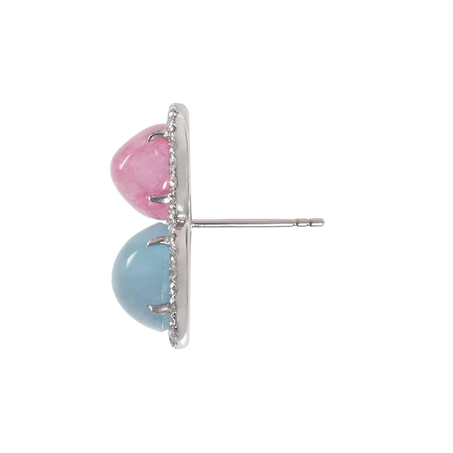 Lovely cabochon sugar pink tourmaline and aquamarine earring surrounded by brilliant cut diamonds. The post is in the middle of the earrings so you can wear them with the blue aquamarine up or down. The earring backs have a stabilizer circle which