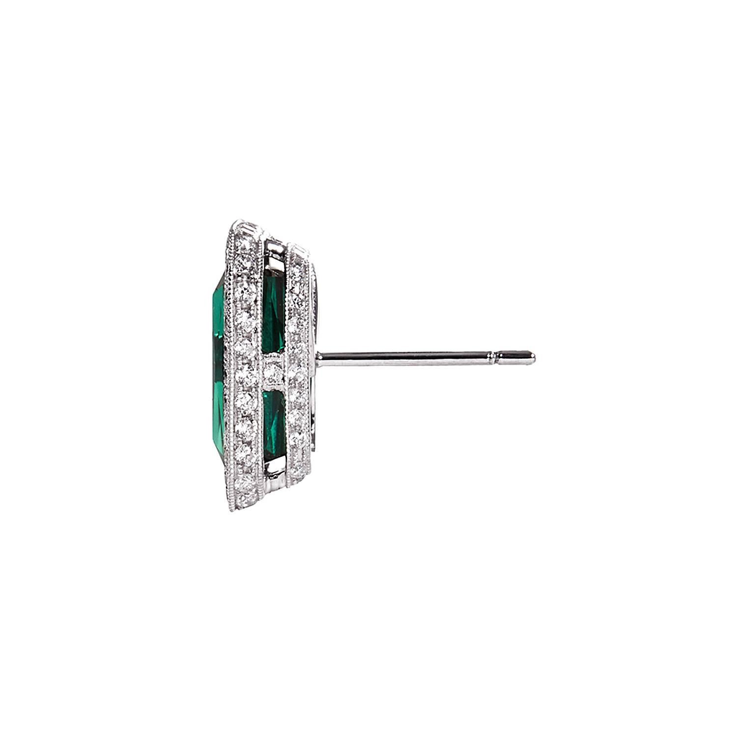 Elegant rectangular mixed cut transparant deep bluish chrome green tourmalines of fine color quality. Hand made and one of a kind earrings with 184 white brilliant cut diamonds in milgrain setting. Matching ring is available.  

Gemstone