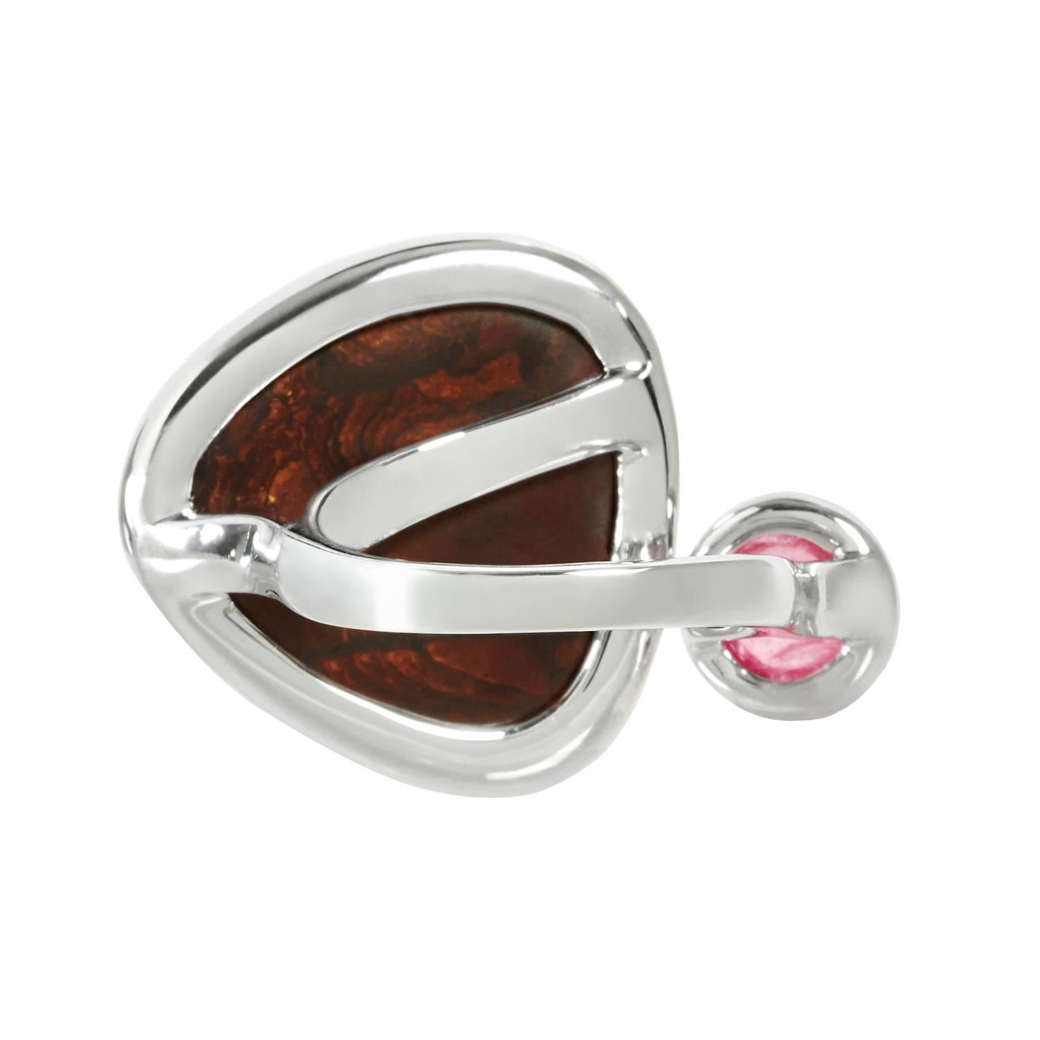 The Bushfire opal ring accented with cabochon Rubellite and diamonds would make a perfect conversation piece. 

Matching Bushfire Opal and Rubellites earrings are available. 

Gemstone information:
1 fine opal 13.57cts
1 pink tourmaline