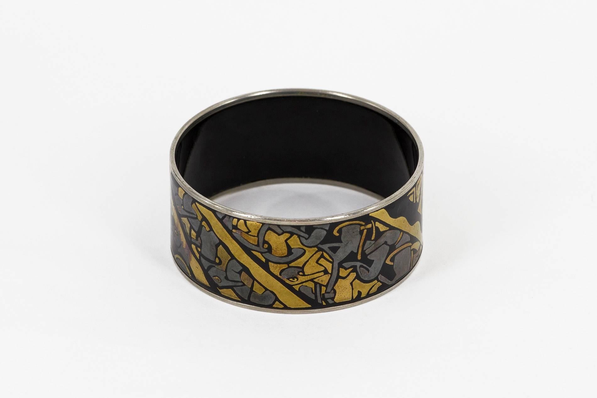 Enameled metal bracelet portraying abstract themes, hand made by Laurana, Pesaro in the 1990s. Signed.