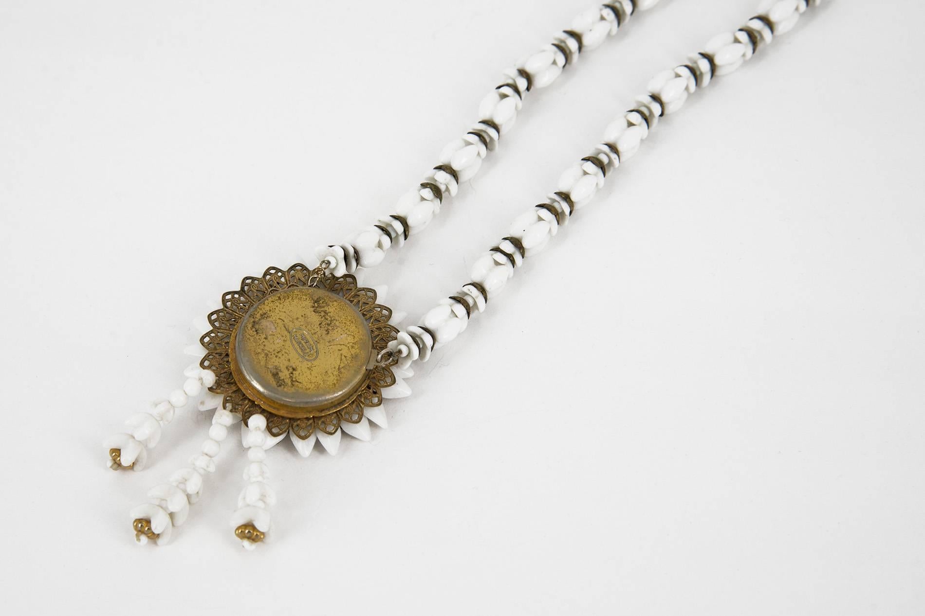 Elegant necklace designed by Miriam Haskell in the 1940s. White glass beads and metal. Good original vintage conditions.