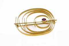 Gold brooch with ruby by Atelier des Orfèvres, Italy, 1960s