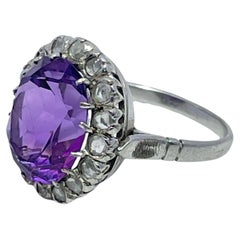 10k White Gold Oval Amethyst and Diamond Halo Ring