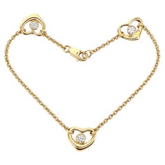 Tiffany & Co. Bracciale Elsa Peretti con cuore in oro giallo 18 carati e diamanti