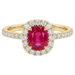 Raja's Empire 1.01ct Ruby and Diamond Halo Ring in 9K Yellow Gold