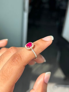 Raja's Empire 1.01ct Ruby and Diamond Halo Ring in 9K Yellow Gold