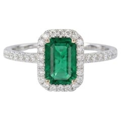 Anello con smeraldo colombiano da 1,20 carati e diamanti a corona in oro bianco 14K