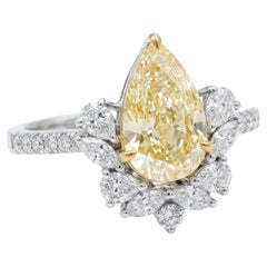 Anello Art Déco con diamante giallo fancy da 2,51 ct in montatura halo, in oro bianco 18 carati