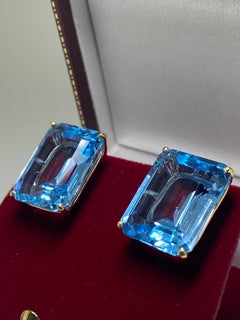 Magnificent Pair of 40.00 Ct Emerald Cut Blue Topaz Yellow Gold Clip on Earrings