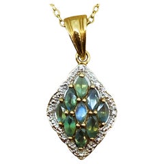1.20ct Bluish Green Cluster Sapphire Pendant in 9K Rose 
White Gold + Chain