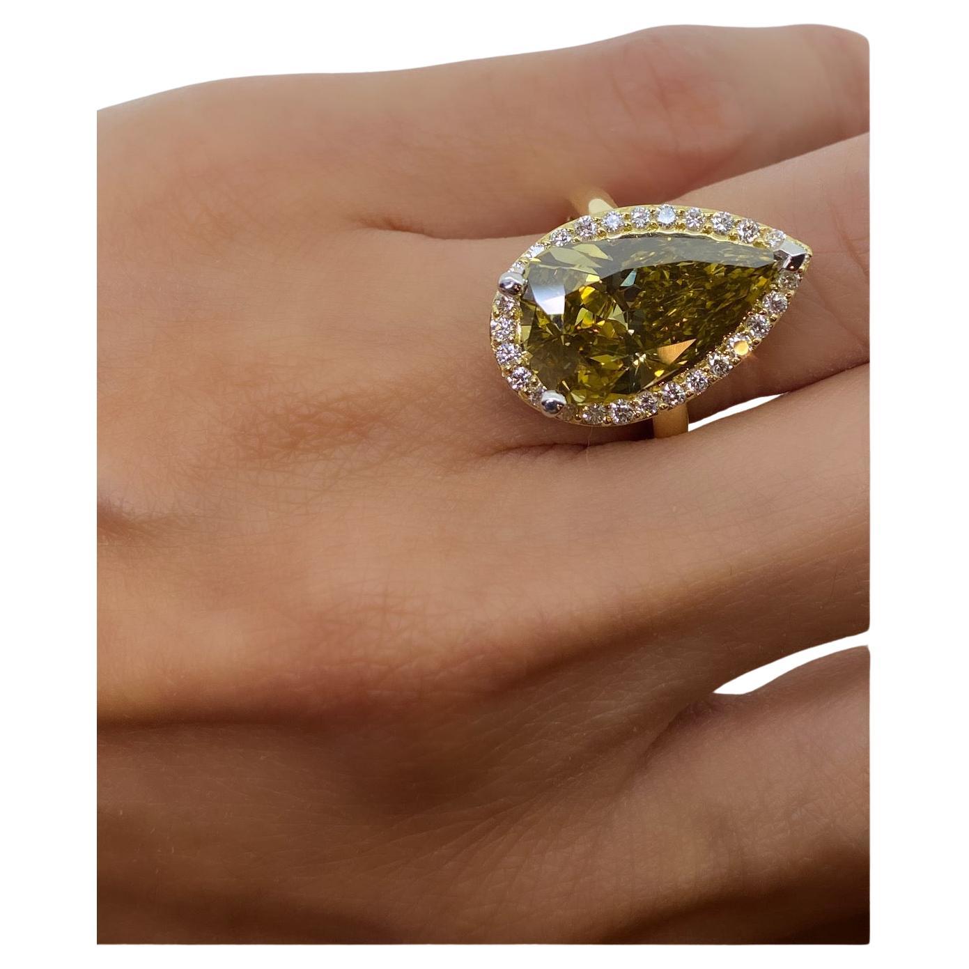 Large 6.36ct Fancy C5 Natural Pear Cut Diamond 18K Gold Ring, AUSCERT certified.