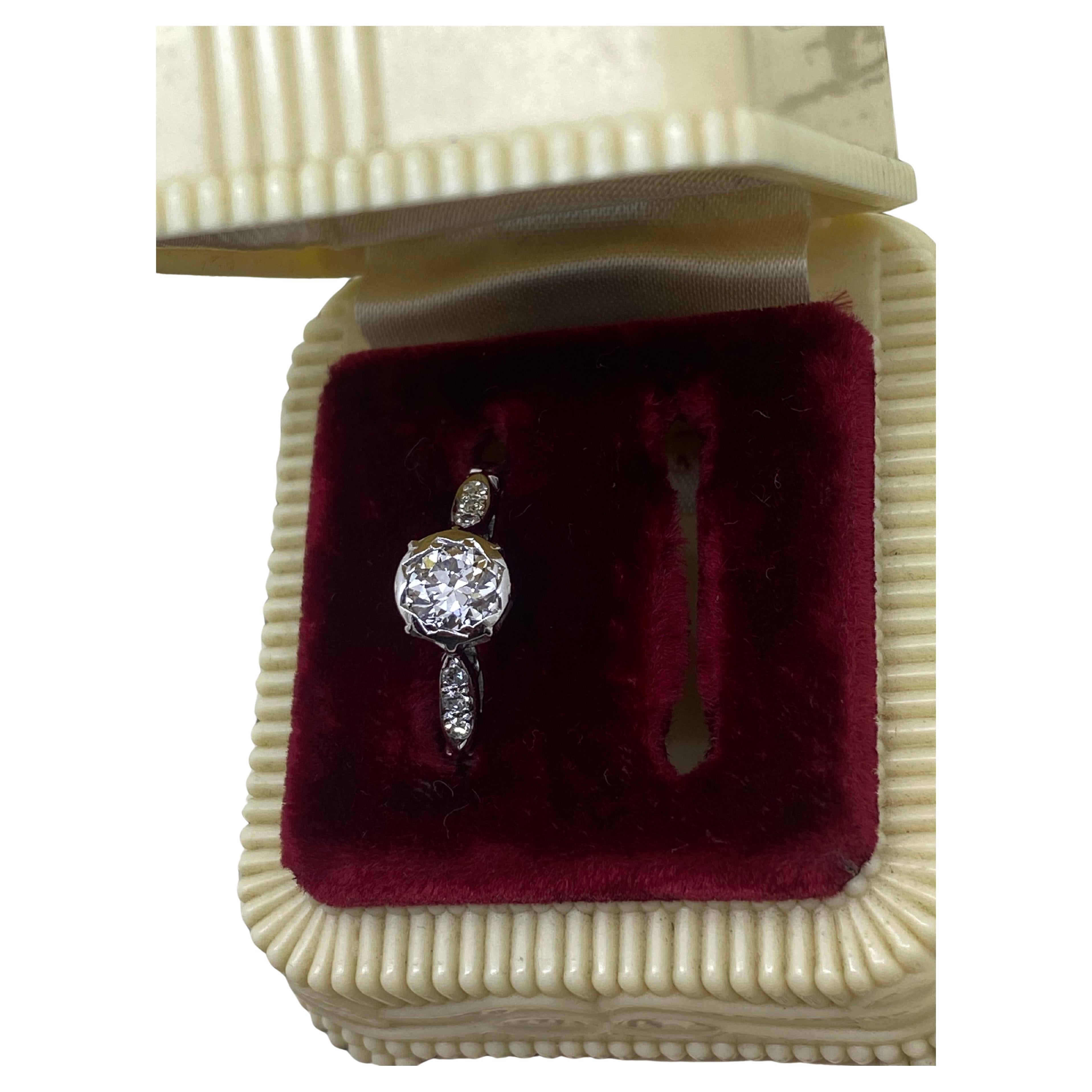 An Art-Deco 0.65ct Old European Cut Diamond Solitaire 18K Gold & Platinum Ring