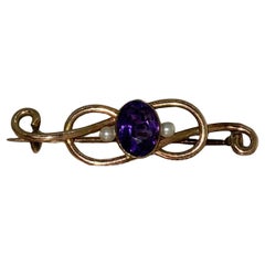 An Art Nouveau 15K /15ct Gold, Seed Pearl & 2.60ct Amethyst Brooch, c 1930's.