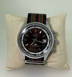 Citron Sports World Time Swiss Manual Watch. Chocolate Dial, Engine Turned Bezel