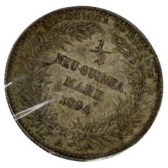 Um 1894: 1/2-Mark-Kolonialmünze aus Deutsch-Neuguinea aus 900er Silber. Berliner Münzprägeanstalt. AU.