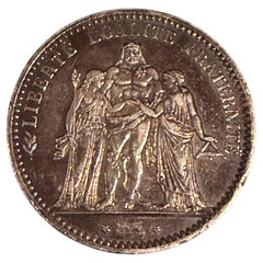 Moneta francese da 5 franchi del 1873 circa, in argento 900, in condizioni AU. Gruppo Hercules, design di A. Dupré.