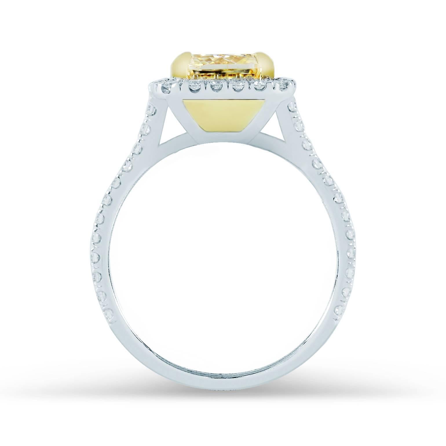 Modern 3.62 GIA cert Radiant  Fancy Yellow diamond Gold Halo Engagement Ring For Sale