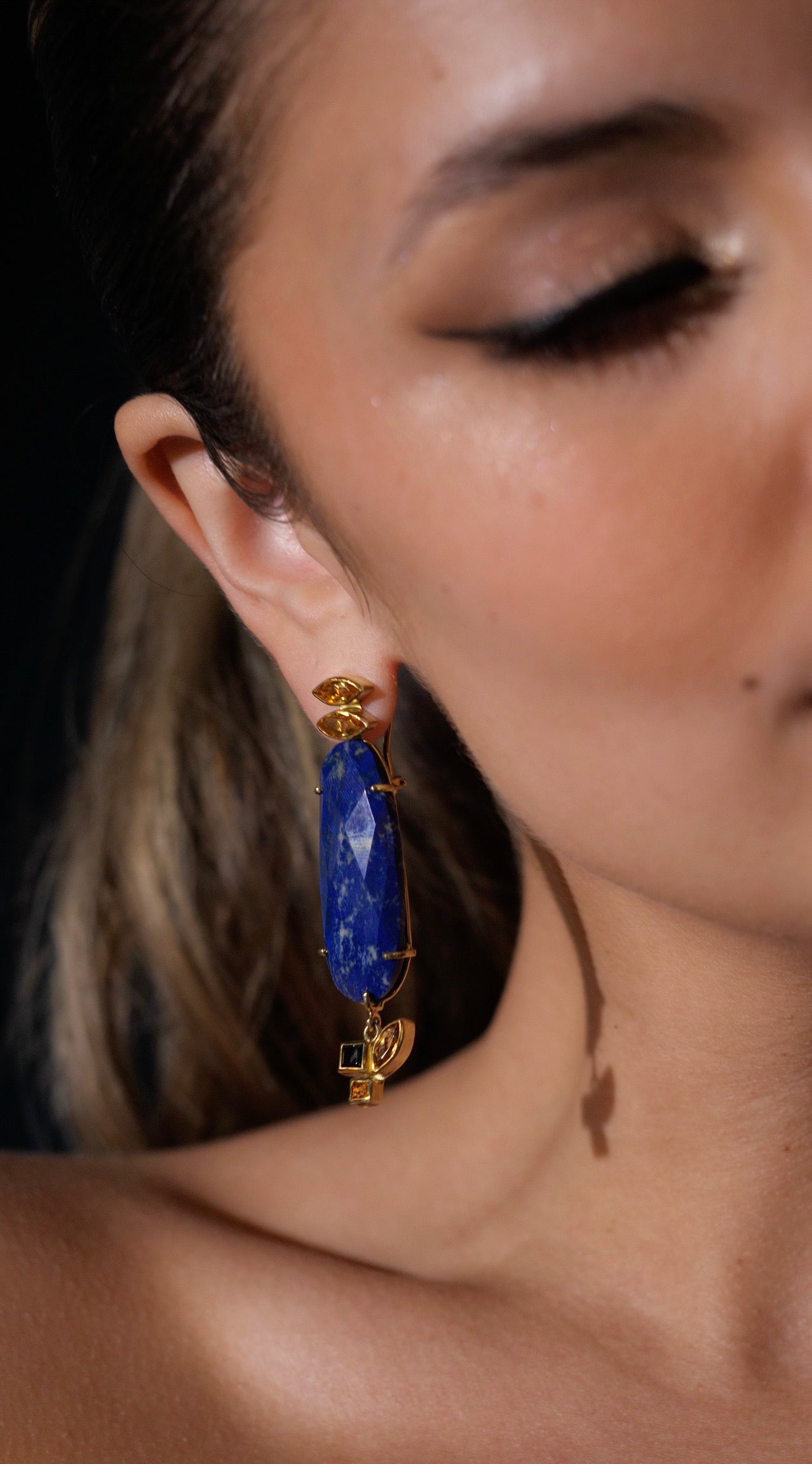 Lapis Lazuli, Tourmaline, Citrine, Pink Sapphire, and Yellow Gold Dangle Earrings, In Stock. These blue lapis cushion drop earrings have a dark blue lapis lazuli stone with white marbling that makes them statement earrings. Rich 18-karat yellow gold