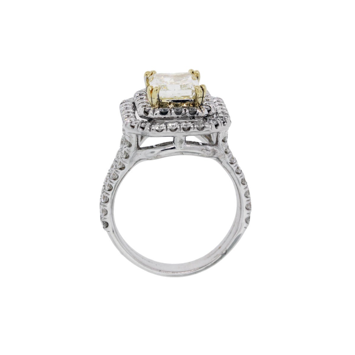 Style: Radiant Fancy Light Yellow 3ctw Diamond Ring
Material :14k White Gold, Mounting is 18k Yellow Gold
Ring Size : 9.25(can be sized)
Diamond Details :Approximately 3ctw of Radiant Cut Diamonds that are G in Color and VS in clarity.
Total
