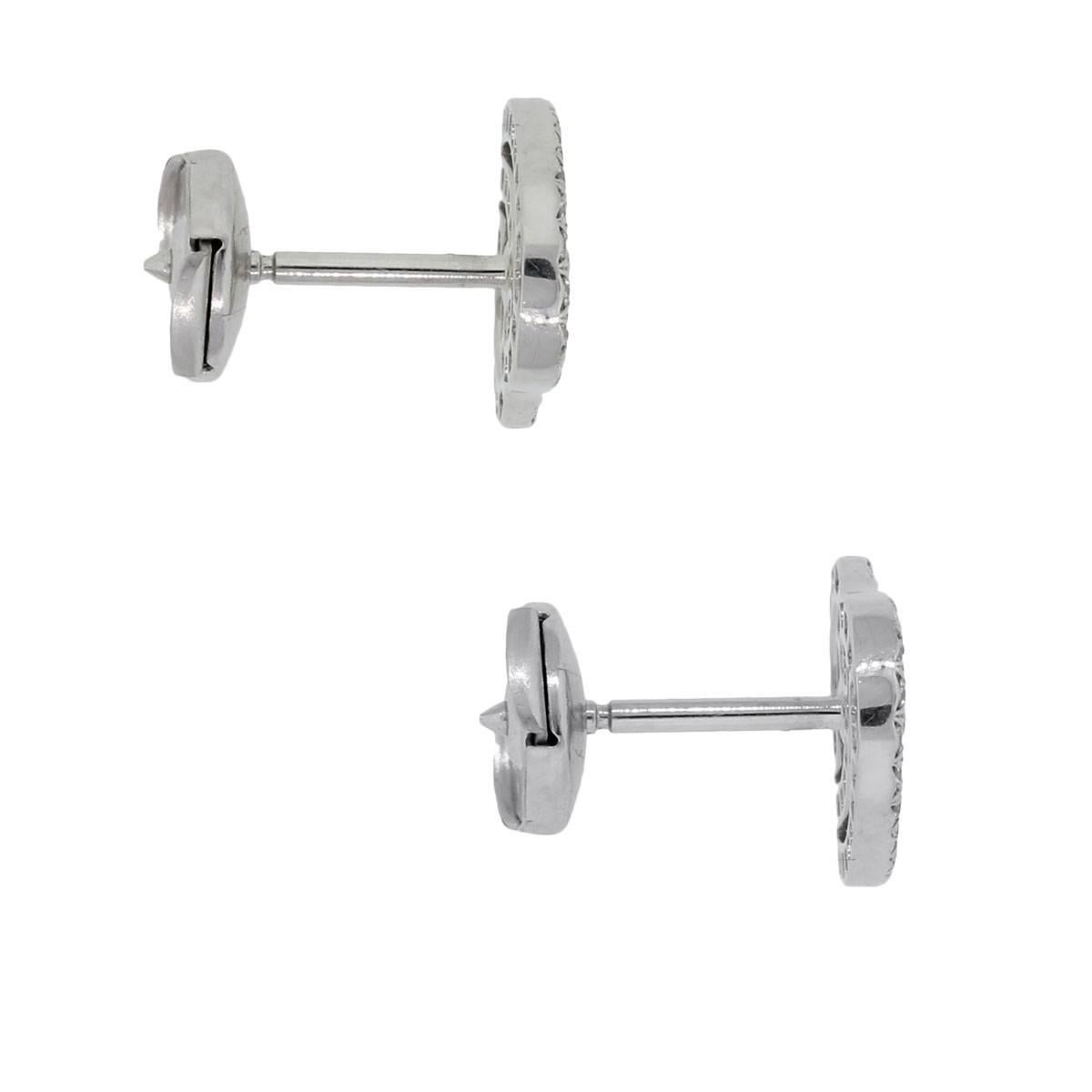 Designer: Tiffany & Co.
Style: Platinum Diamond Heart Earrings
Material: Platinum
Diamond Details: Approximately 0.22ctw of round brilliant diamonds, diamonds are F/G in color and VS in clarity.
Fastening: La Pousettes
Measurements: 0.49