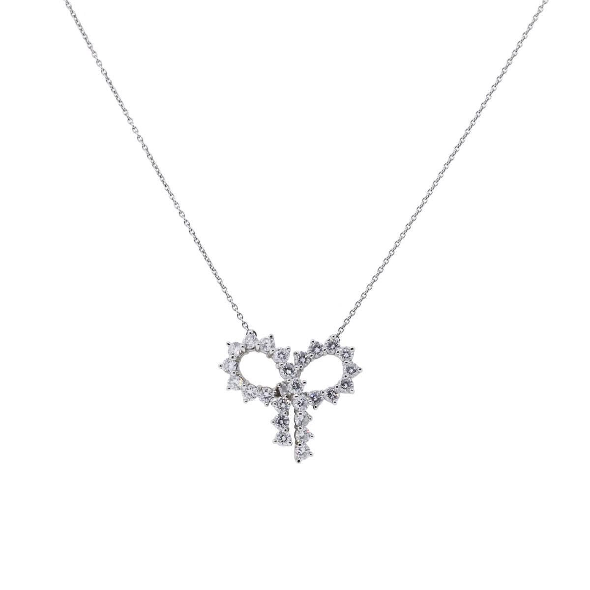 Style: Tiffany & Co. Platinum Diamond Large Bow Pendant Necklace
Length: Necklace is 17