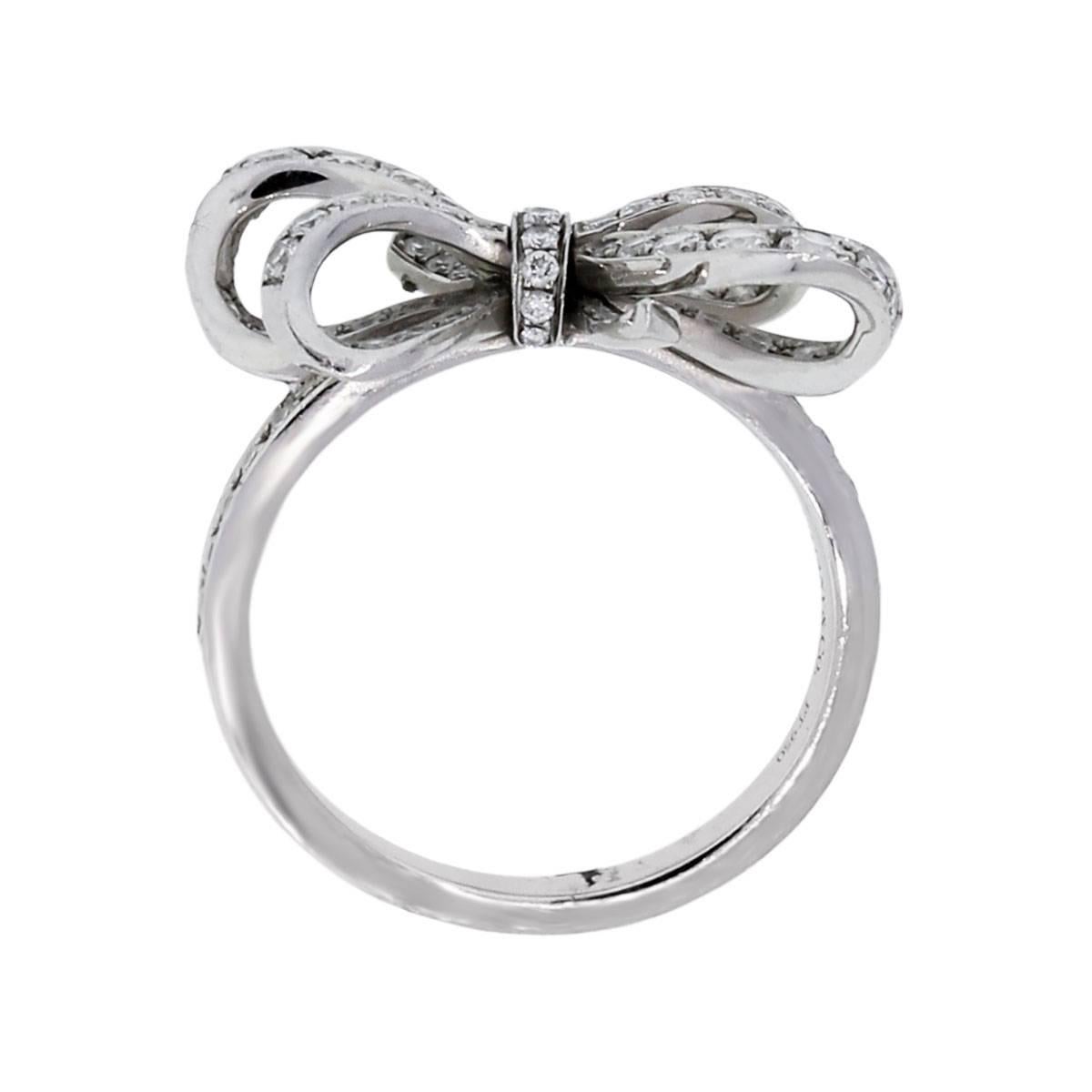 Brand: Tiffany & Co.
Material: Platinum
Diamond Details: Approximately 0.51ctw of Round Brilliant Diamonds. Diamonds are E-F in color and VS in clarity.
Ring Size: 5.50
Ring Measurements: 0.87