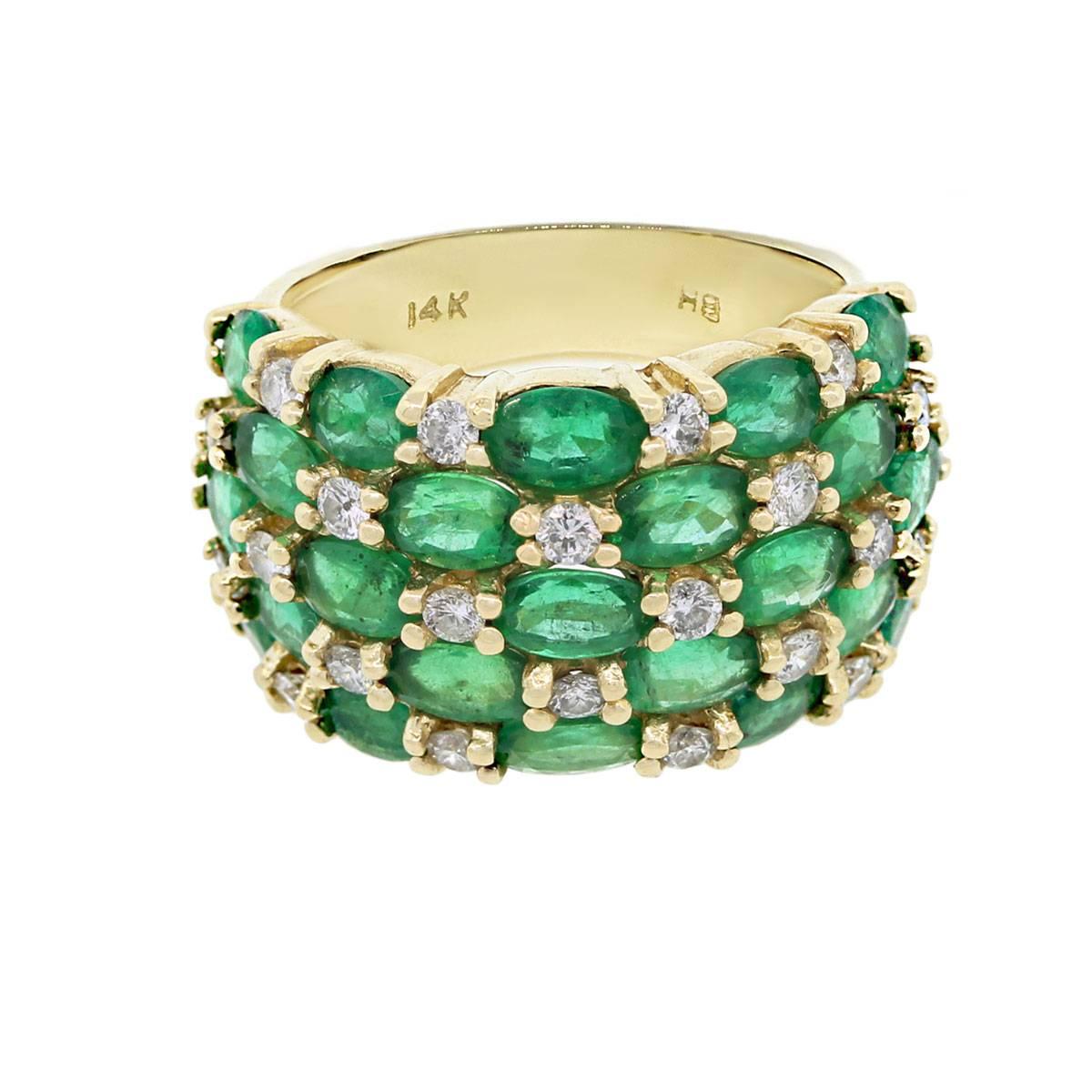Style: 14k Yellow Gold 0.66ctw Diamond Emerald Multi Row Ring
Material: 14k Yellow Gold
Gemstone Details: Approximately 3.45ctw in Emeralds
Diamond Details: Approximately 0.66ctw in Diamonds, G/H in color and VS in clarity
Ring Measurements: