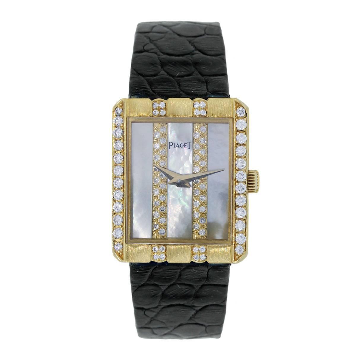 Brand: Piaget
Style: 18k Yellow Gold Diamond MOP Dial on Leather Watch
Case Material: 18k Yellow Gold
Case Diameter: 19mm X 23mm
Bezel: Round Brilliant Diamond bezel
Dial: Mother of Pearl Diamond Dial with gold hands
Bracelet: Black Leather
Size: