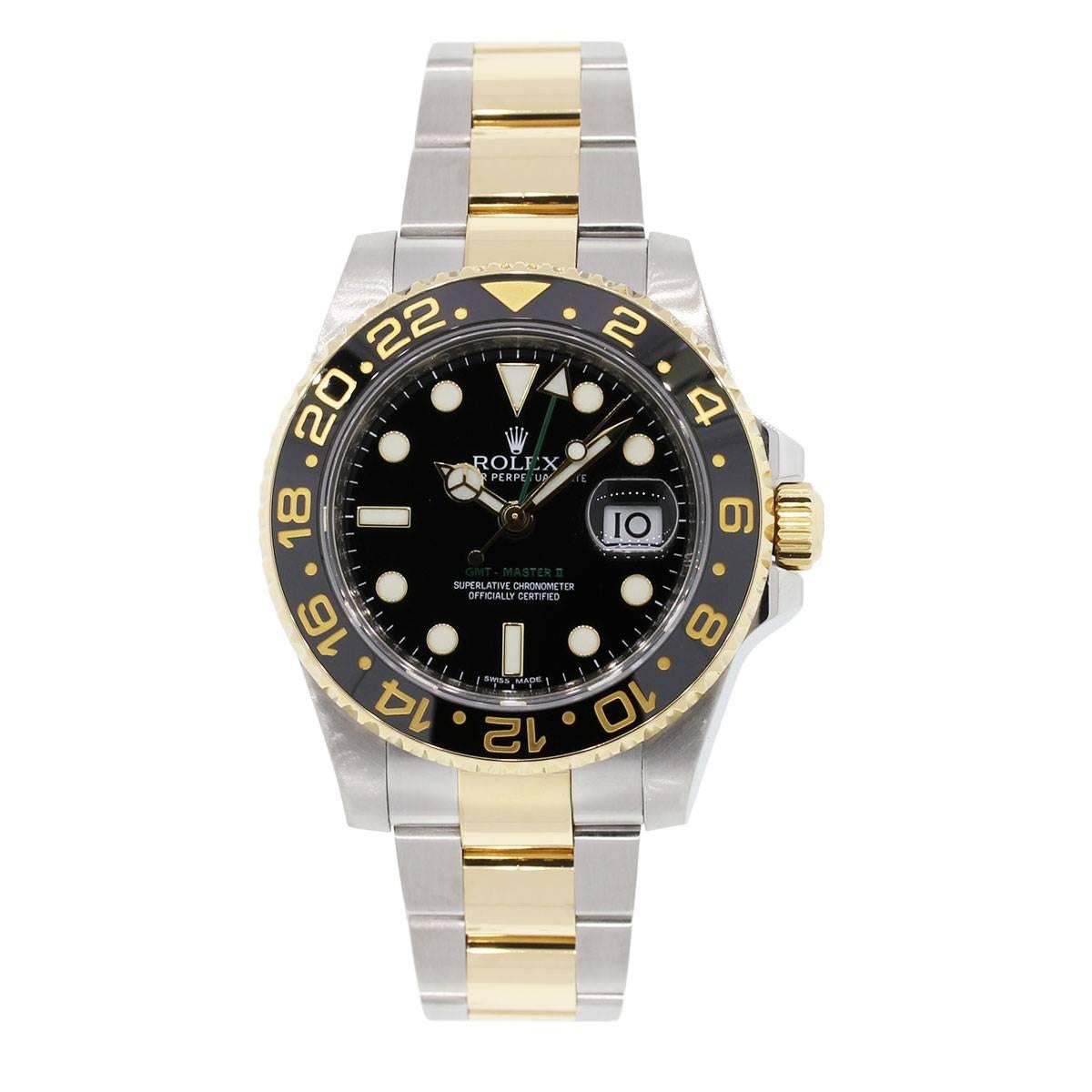 Brand: Rolex
MPN: 116713
Model: GMT-Master II
Serial: Scrambled serial
Case Material: Stainless Steel
Case Diameter: 40mm
Bezel: Ceramic black and yellow bidirectional bezel
Dial: Black dial with date window at 3 o'clock
Bracelet: Two Tone