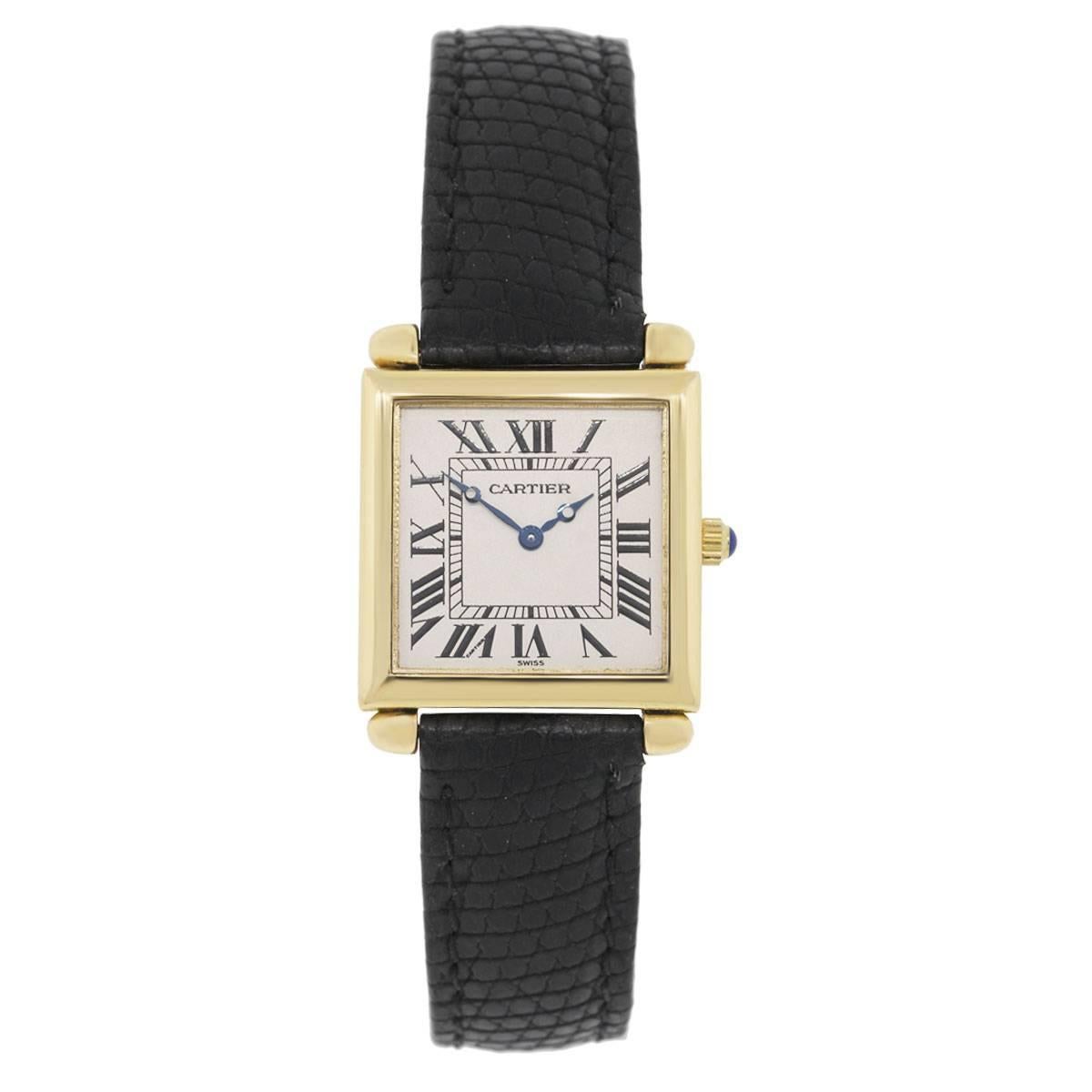 Brand: Cartier
MPN: 1630
Model: Tank Obus
Case Material: 18k Yellow Gold
Case Diameter: 24mm
Bezel: 18k yellow gold smooth fixed bezel
Dial: White roman dial with blue hands
Bracelet: Black leather
Size: Will fit a 6.25
