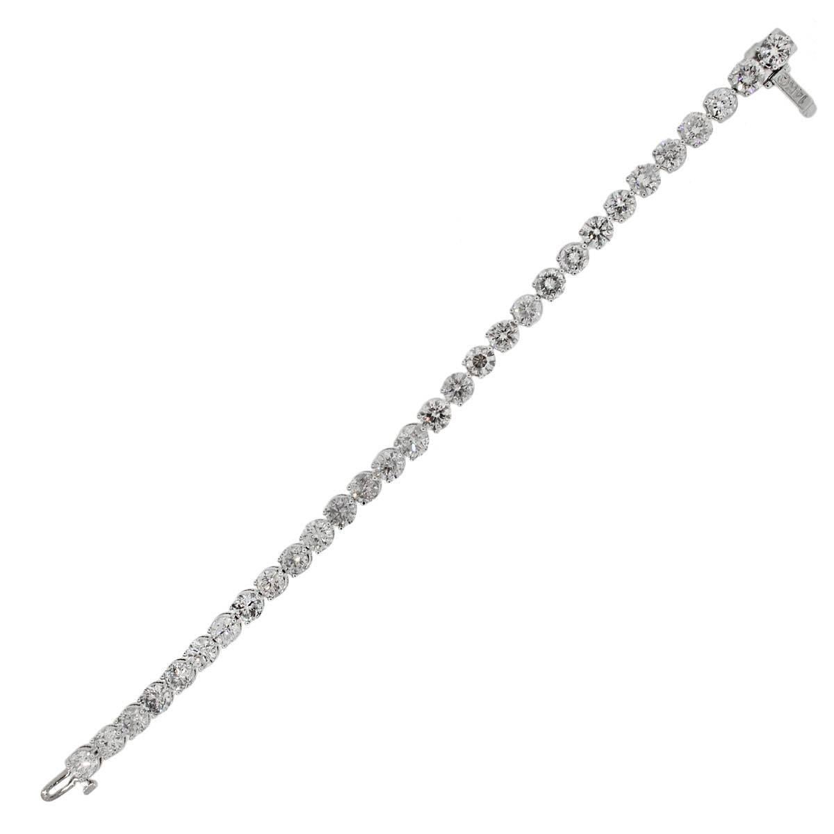 Material: 14k white gold
Diamond Details: 30 Diamonds that are approximately 12.67ctw white round diamonds. Diamonds are J-L  promotional quality.
Clasp: Tongue in box Clasp
Total Weight: 18.2g (11.7dwt)
Measurements: will fit up to a 6.5