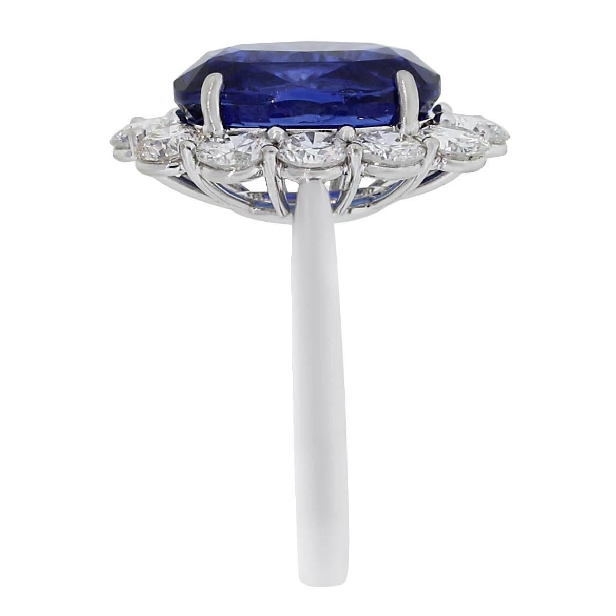 Style: Platinum Round Brilliant Diamond Sapphire Ring
Material: Platinum
Diamond Details: Approximately 1.88ctw Round Brilliant Diamonds. Diamonds are F/G in color and VS in clarity
Gemstone Details: Approximately 7.02ct of Blue oval Sapphire