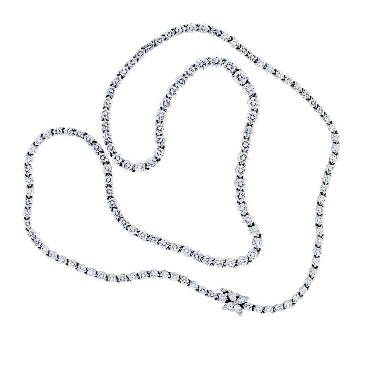 Style: Tiffany & Co. Platinum Diamond Victoria Tennis Necklace
Material: Platinum
Diamond Details: Approx. 12.5ctw of round Diamonds and marquise Diamonds placed into a flower shape.
Diamond Color: F
Diamond Clarity: V/S
Chain Length: