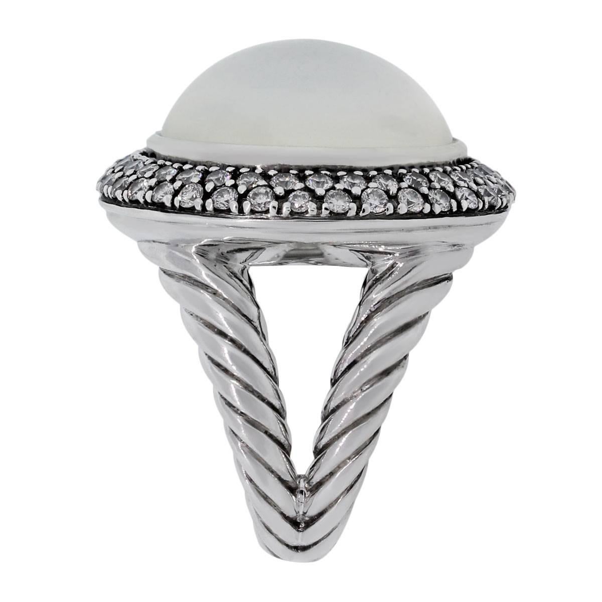 Designer: David Yurman
Material: Sterling silver
Diamond Details: Approximately 0.70ctw round brilliant diamonds. Diamonds are G/H in color and VS in clarity.
Gemstone Details: Round shape moonstone measuring approximately 17mm in diameter
Ring