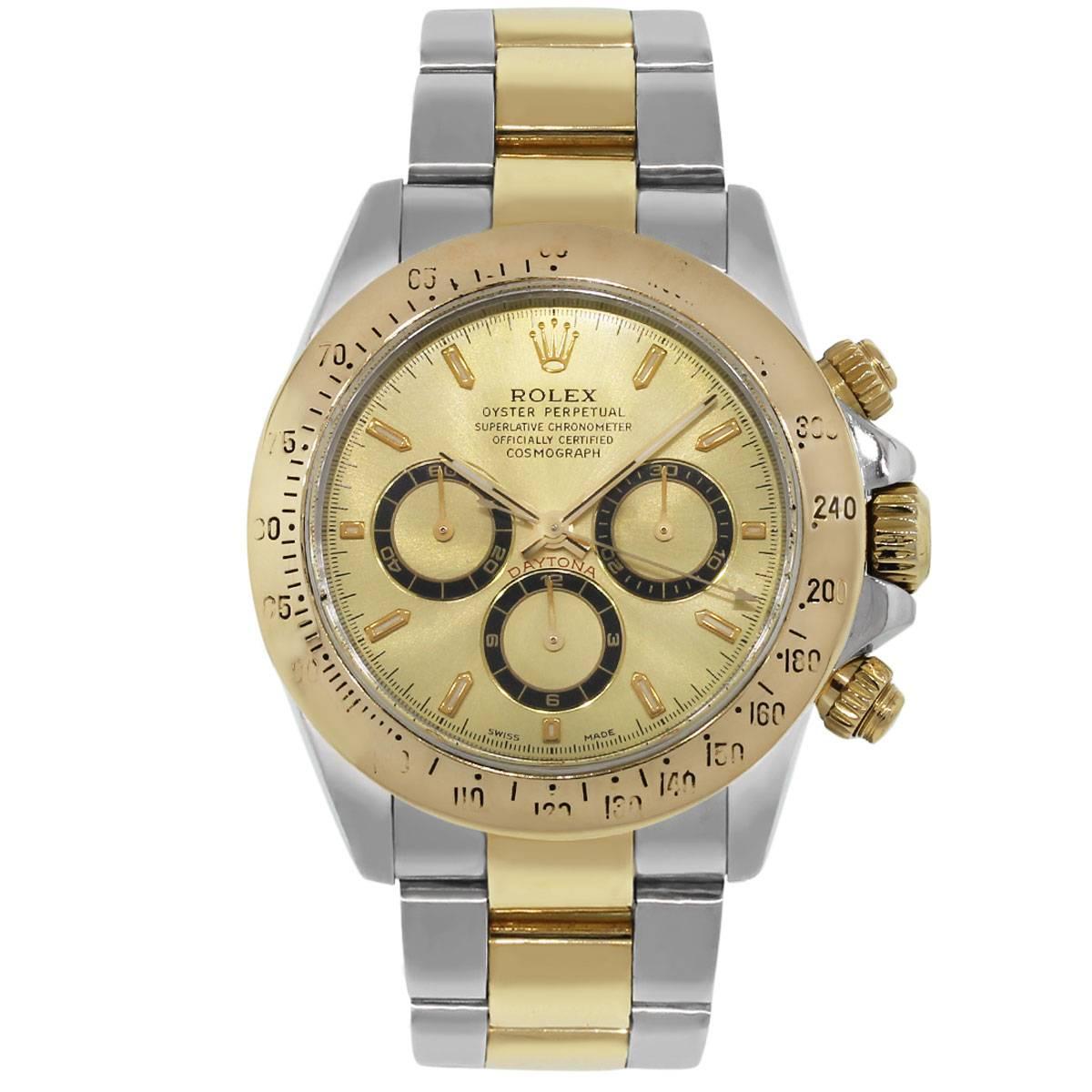 Brand: Rolex
MPN: Daytona
Model: 16523
Case Material: 18k yellow gold and stainless steel
Case Diameter	: 40mm
Crystal: Scratch resistant sapphire
Bezel: Fixed 18k yellow gold with engraved Tachymeter
Dial: Champagne Dial with Luminescent