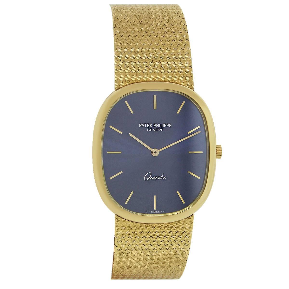 Brand: Patek Philippe
Model Number: 3838/005
Case Measurement: 30mm x 35mm
Case Material: 18k Yellow Gold
Dial: Blue dial with yellow gold stick hour markers.
Bracelet: 18k yellow gold bracelet
Clasp: Hidden Deployment Clasp
Crystal: