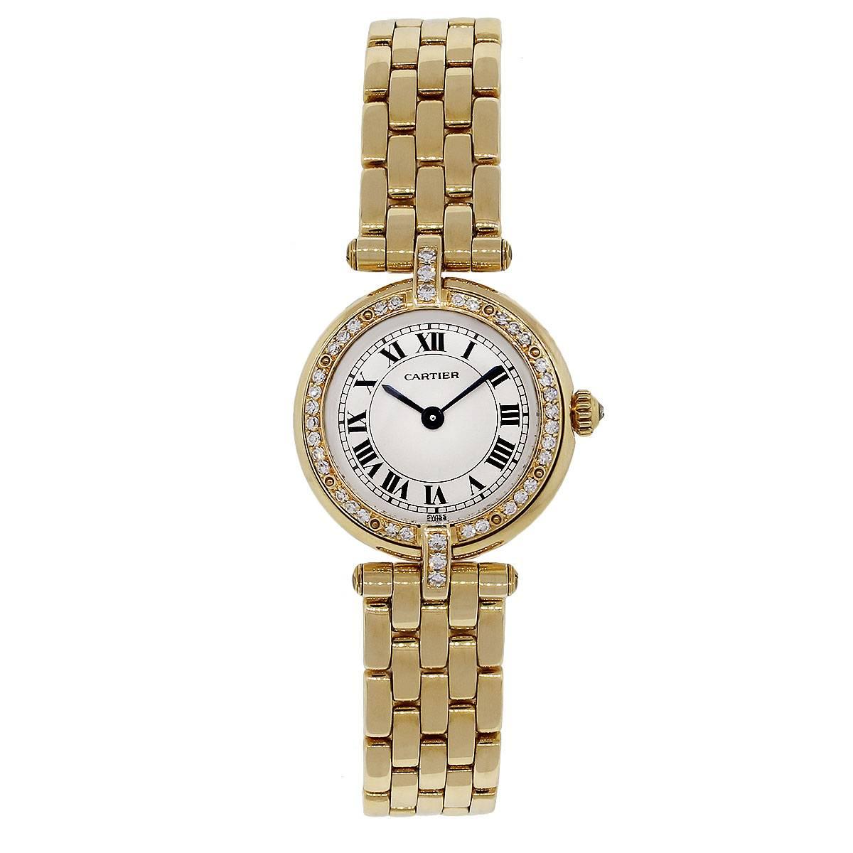 Brand: Cartier
Model: Cougar
Case Measurement: 23 mm
Case Material: 18k Yellow Gold
Bezel: 18k Yellow Gold diamond fixed bezel
Dial: Cream Dial with Black Roman Numeral Hour Markers and Date; Blue Steel Hands
Bracelet: 18k Yellow Gold