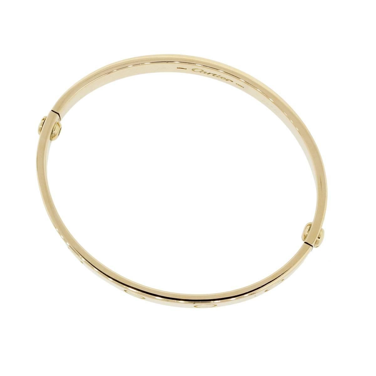 Brand: Cartier
Style: Love Bangle
Metal: 18K Yellow Gold
Bracelet Size: Cartier size 16 (will fit a 5.75" wrist)
Total Weight: 29.3g (18.9dwt)
Closure: (2) Screw Closure
Additional Details: Comes with Raymond Lee Jewelers Presentation