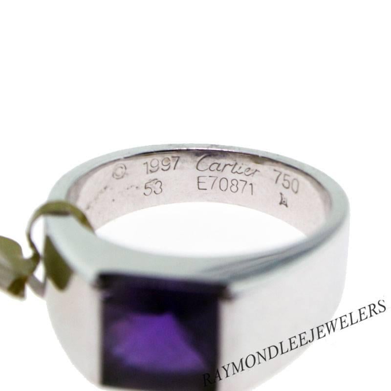 Designer	Cartier
Metal	White Gold
Gemstones	7mm by 7 mm Square Cabachon Cut Amthethyst (Small Chip on Corner)
Size	6.5
Weight	11.2 grams (or 7.2 dwt)
SKU: 110-11799