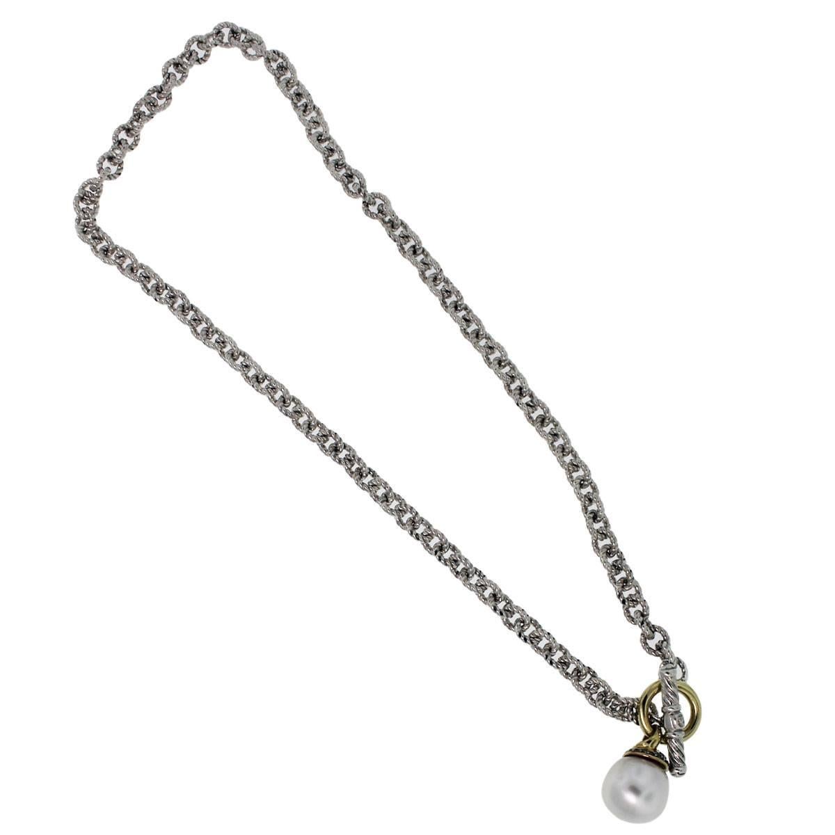 Designe: David Yurman
Style: Sterling silver & 18k Yellow Gold Pearl Drop Necklace
Material: Sterling Silver and 18K Yellow Gold
Necklace Length: 16.75