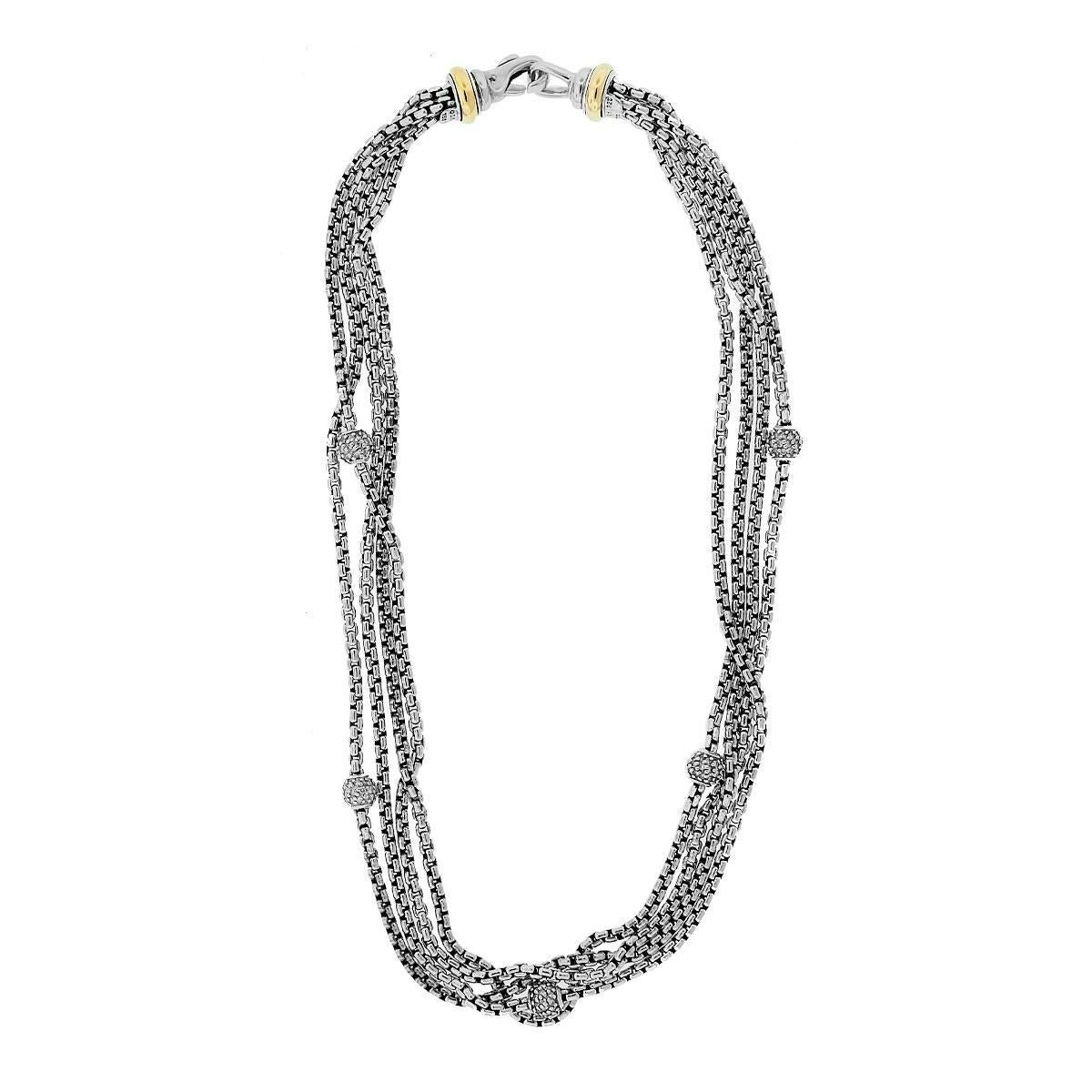 Designer: David Yurman
Style: David Yurman Two Tone Multi Strand Diamond Necklace
Material: Sterling Silver and 18K Yellow Gold
Diamond Details: Round brilliant diamonds. Diamonds are G/H in color and VS in clarity
Necklace Length: 16.0