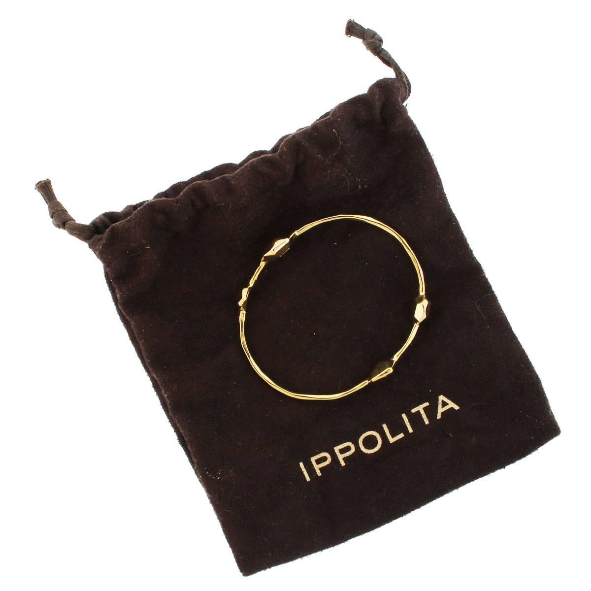 Brand
Ippolita
Style	18k Yellow Gold Bangle Bracelet
Material	18k Yellow Gold
Total Weight
7.4g (4.8dwt)
Measurements	Will fit a 8" wrist
Closure	No Clasp, Slip On
Additional Details
Comes with Ippolita bangle bracelet pouch!
SKU
G3980UEE