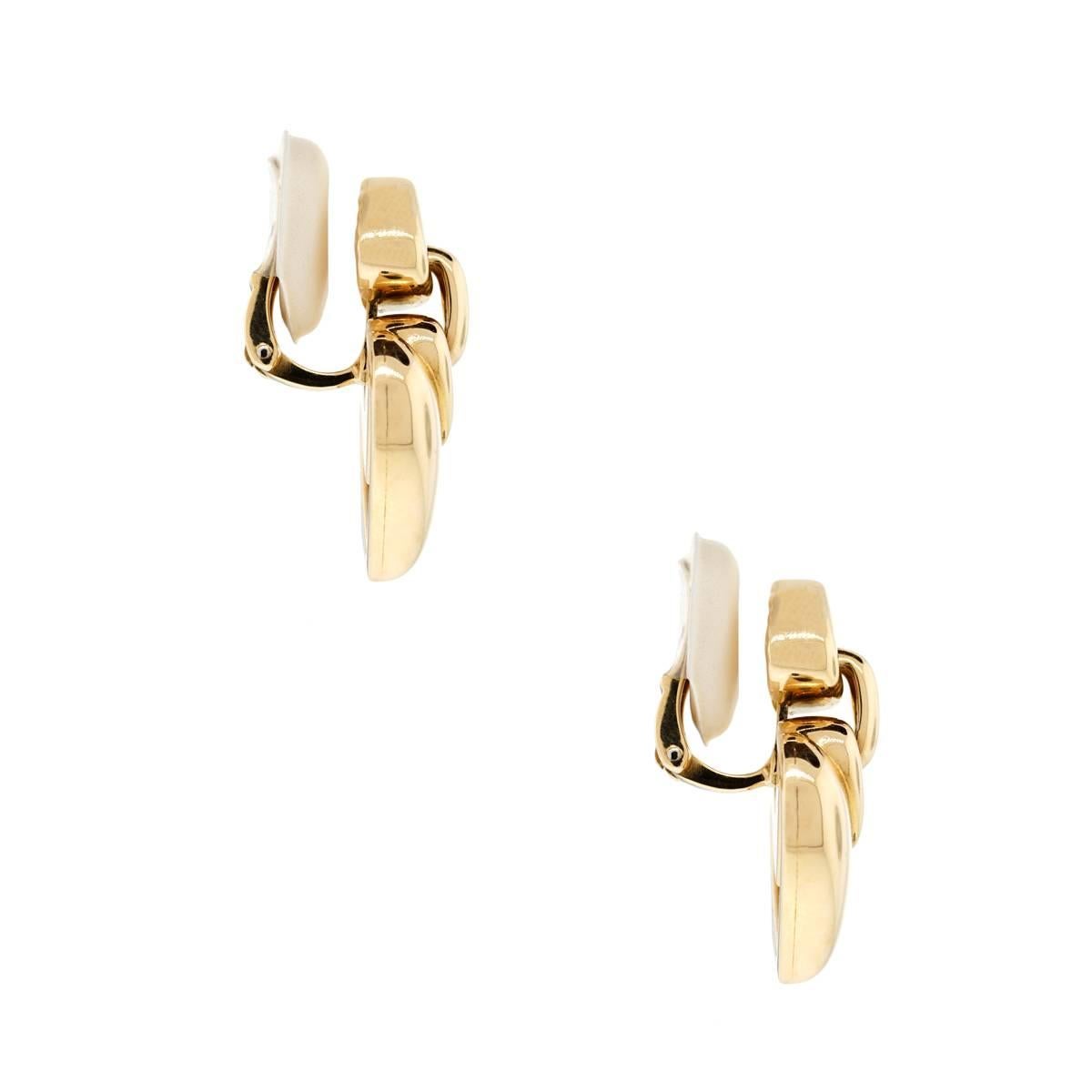 Material: 18k yellow gold
Style: Heart earrings
Earring Measurements: 1.4" x 0.8" x 0.6"
Total Weight: 31.2g (20.1dwt)
Clasp: Clip on
Additional Details: This item comes with a Raymond Lee Jewelers presentation box!
SKU: 11011169