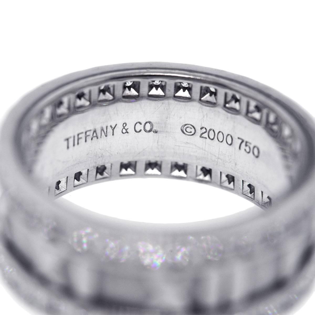 Brand: Tiffany & Co.
Collection: Atlas
Material: 18k White Gold
Diamond Details: Approximately 1.31ctw round brilliant cut diamonds. Diamonds are G/H in color and VS in clarity.
Total Weight: 10.7g (6.8dwt)
Measurements: 0.80" x 0.35"