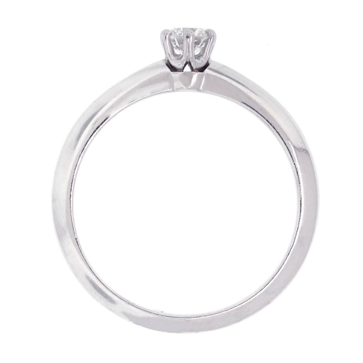 Designer: Tiffany & Co.
Material: Platinum
Diamond details: Approximately 0.21ct round brilliant diamond. Diamond is G/H in color and VS in clarity.
Ring Size: 6 (can be sized)
Total Weight: 3.3g (2.2dwt)
Measurements: 0.95" x 0.20" x