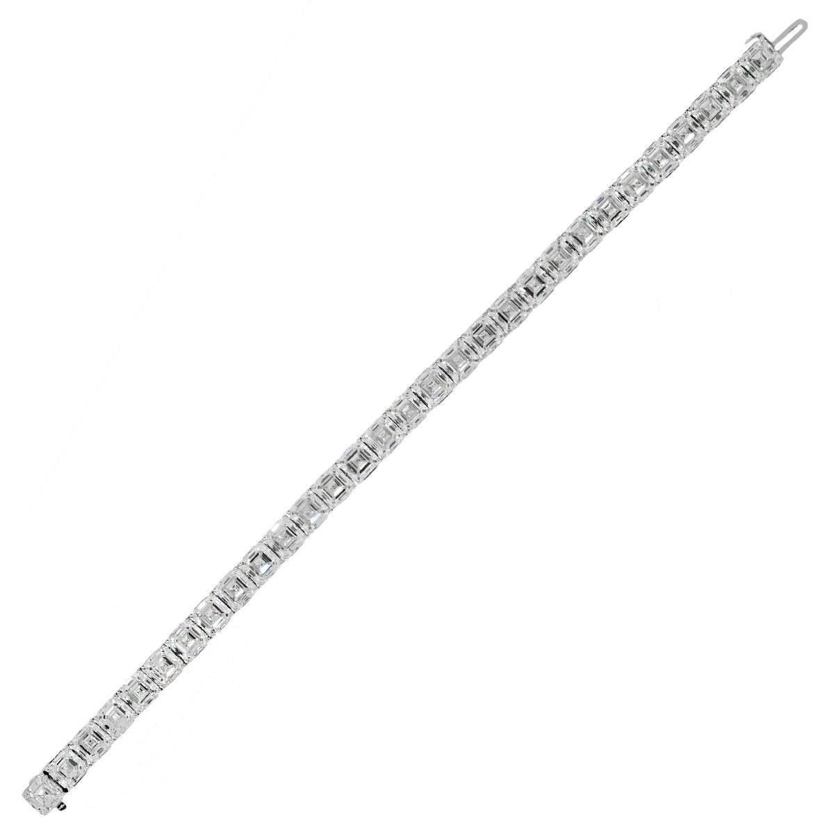 Material: 18k White Gold
Diamond Details: 30 asscher cut diamonds that have approximately 30.38ctw. Diamonds are F/H in color and VS in clarity.
Clasp: Tongue in box Clasp
Total Weight: 20.1g (12.9dwt)
Measurements: Will fit a 7