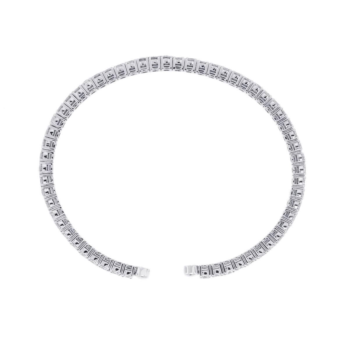 Material: 14k white gold
Diamond Details: Approximately 5.22ctw of round brilliant diamonds. Diamonds are G/H in color and VS in clarity.
Total Weight: 14.0g (9.0dwt)
Measurements: Fits up to a 7