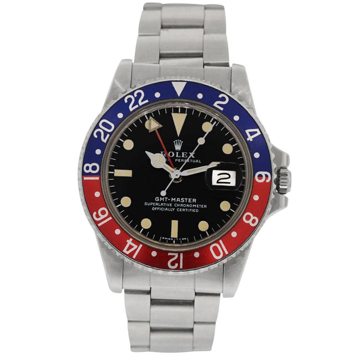 Brand: Rolex
Model: GMT Master
MPN: 1675
Case Material: Stainless Steel
Case Diameter: 40 mm
Bezel: Pepsi Bezel
Dial: Black Dial
Movement: Automatic
Size:	 Will fit a 7" wrist
SKU: "2 Mill"
Additional Details: This Item Comes with
